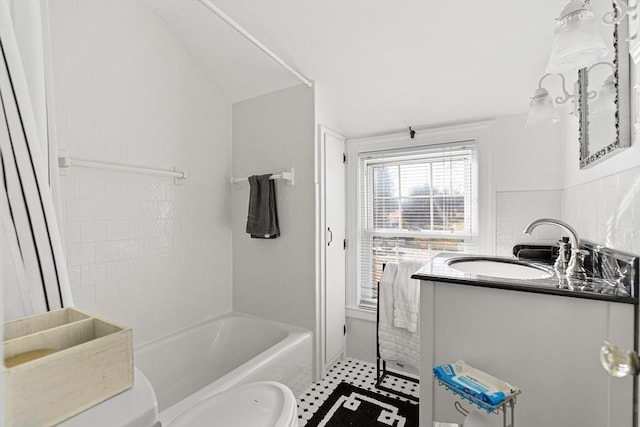 bathroom with tile patterned floors, tub / shower combination, and vanity