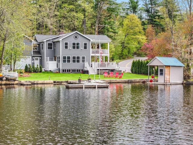 2 Coles Grove Rd, Derry, NH 03038 - rear view of house featuring a water view, a balcony, a lawn, and a wooded view