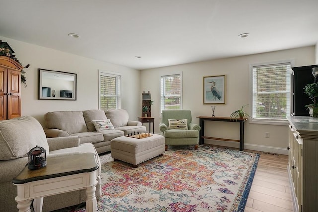 2 Coles Grove Rd, Derry, NH 03038 - living room featuring healthy amount of natural light, light wood-style flooring, baseboards, and recessed lighting