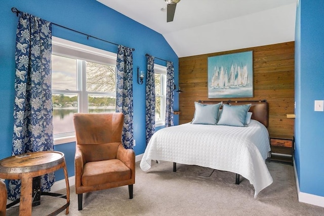 2 Coles Grove Rd, Derry, NH 03038 - carpeted bedroom featuring vaulted ceiling, wooden walls, a ceiling fan, and baseboards