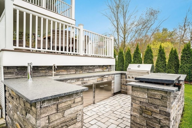 2 Coles Grove Rd, Derry, NH 03038 - view of patio featuring a sink