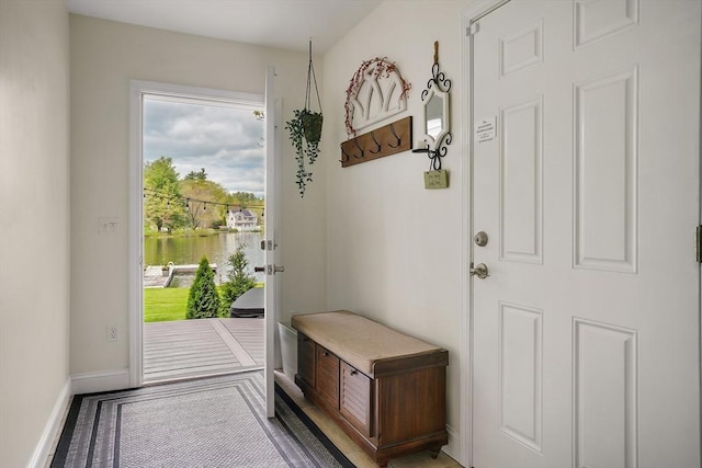 2 Coles Grove Rd, Derry, NH 03038 - doorway to outside featuring baseboards and a water view