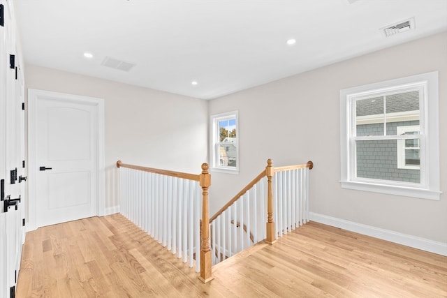 hallway featuring light hardwood / wood-style flooring