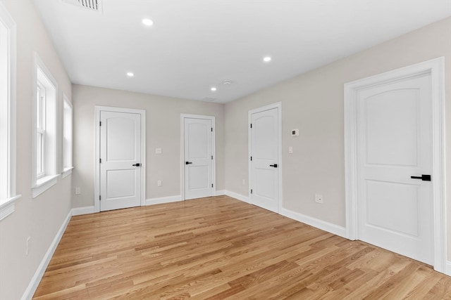 unfurnished bedroom featuring light hardwood / wood-style floors