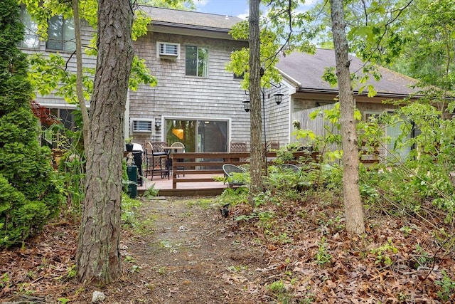 15 Roundhouse Rd Unit 15, Bourne, MA 02532 - back of house with a deck and roof with shingles