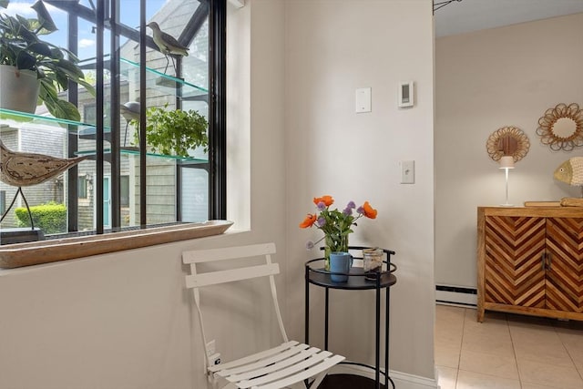 15 Roundhouse Rd Unit 15, Bourne, MA 02532 - hall featuring tile patterned flooring, baseboard heating, and baseboards