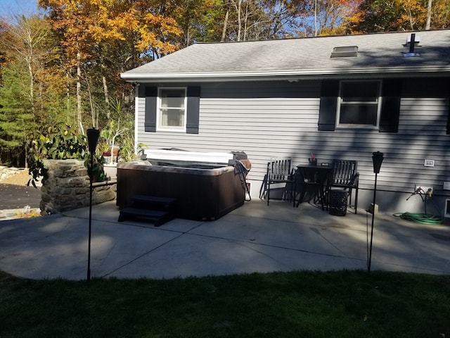 view of patio with a hot tub