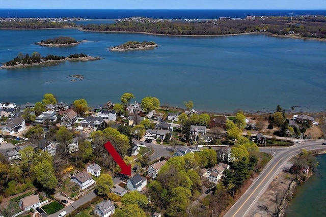 bird's eye view with a water view and a residential view