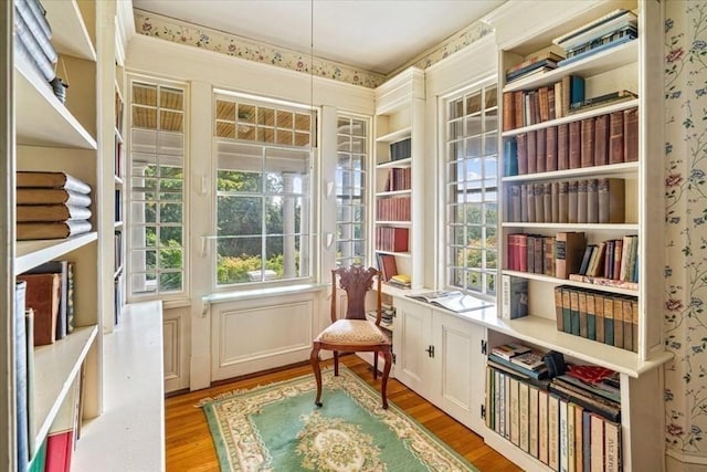 48 Neal Gate St, Scituate, MA 02066 - living area featuring wallpapered walls, a wealth of natural light, and wood finished floors