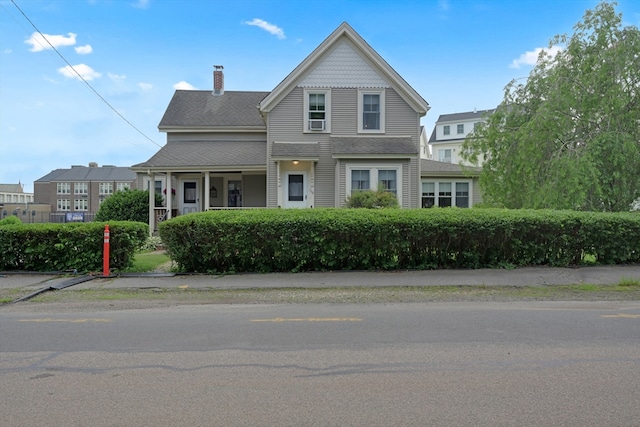 246 Railroad Ave, Norwood, MA 02062 - view of front facade with a chimney