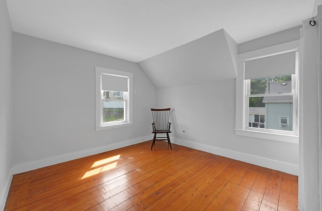 246 Railroad Ave, Norwood, MA 02062 - additional living space featuring hardwood / wood-style floors and vaulted ceiling