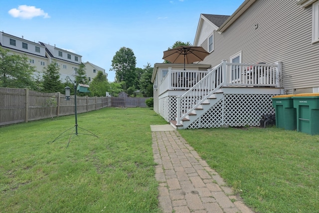 246 Railroad Ave, Norwood, MA 02062 - fenced backyard with a deck and stairway