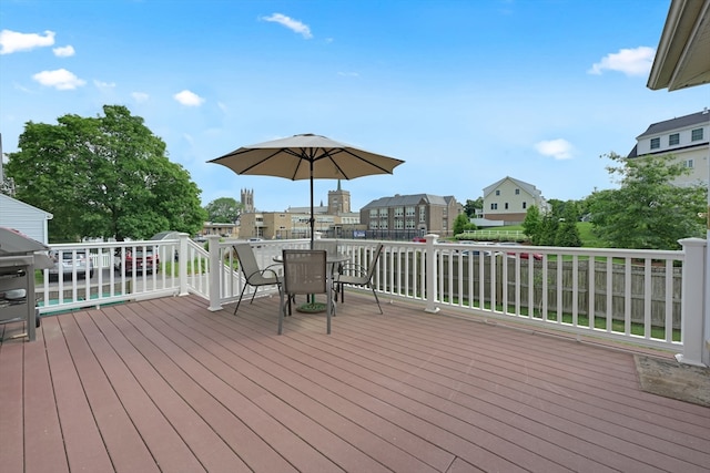 246 Railroad Ave, Norwood, MA 02062 - wooden deck featuring outdoor dining space and a residential view