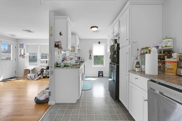 246 Railroad Ave, Norwood, MA 02062 - kitchen with dishwasher, plenty of natural light, and white cabinets