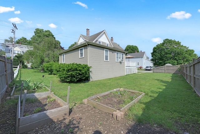 246 Railroad Ave, Norwood, MA 02062 - fenced backyard with a garden
