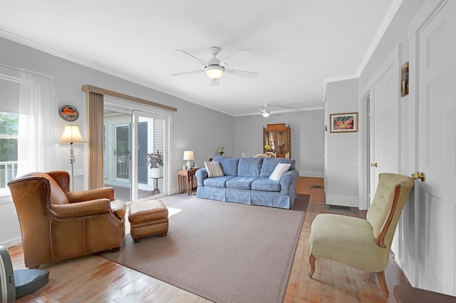 246 Railroad Ave, Norwood, MA 02062 - living area with a ceiling fan, wood finished floors, and crown molding