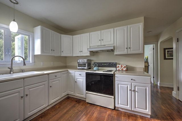kitchen featuring range with electric stovetop, a sink, under cabinet range hood, and light countertops