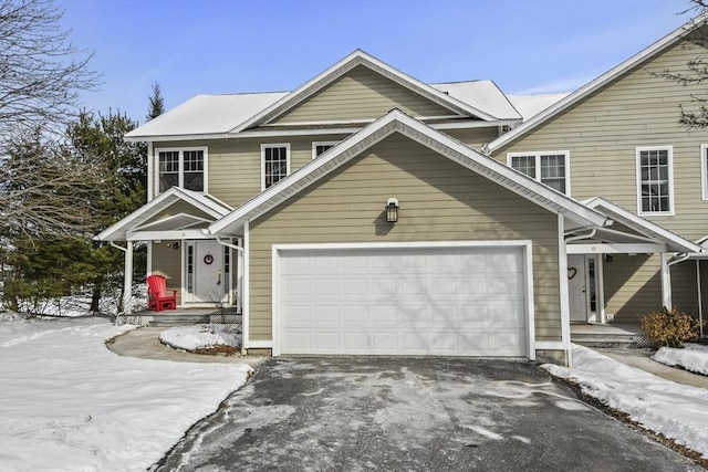 view of front of property featuring a garage and driveway