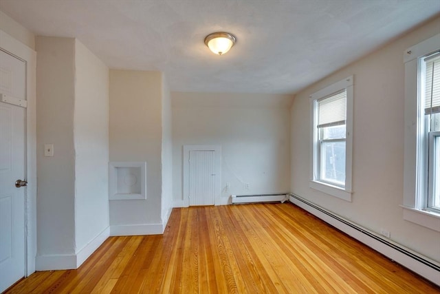 25-29 Chapel St, Norwood, MA 02062 - spare room featuring baseboard heating, plenty of natural light, and light wood-style flooring