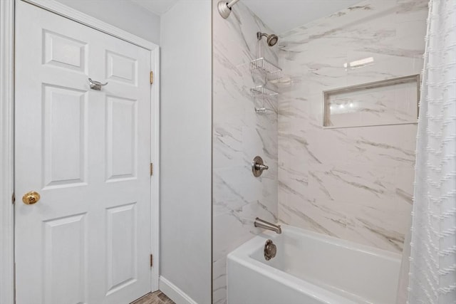 bathroom featuring shower / tub combo with curtain