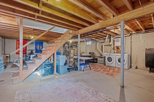 basement featuring washing machine and dryer