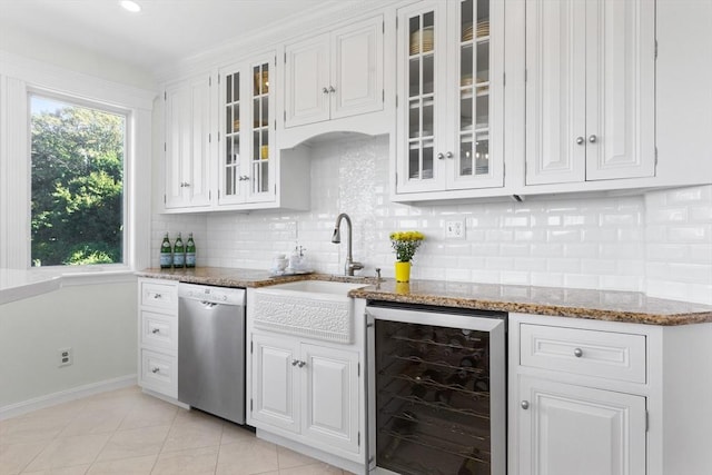 kitchen featuring white cabinetry, wine cooler, glass insert cabinets, and stainless steel dishwasher