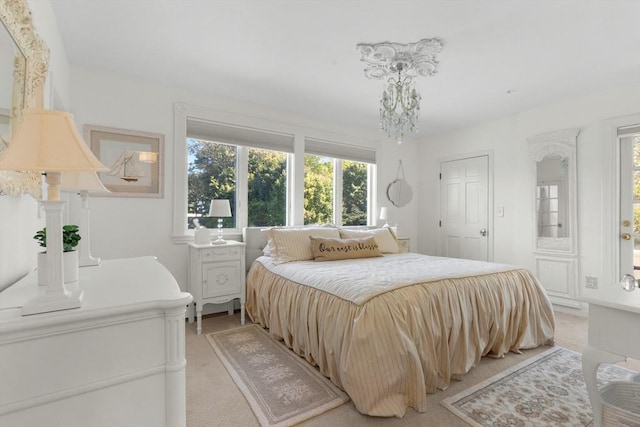 bedroom featuring light colored carpet