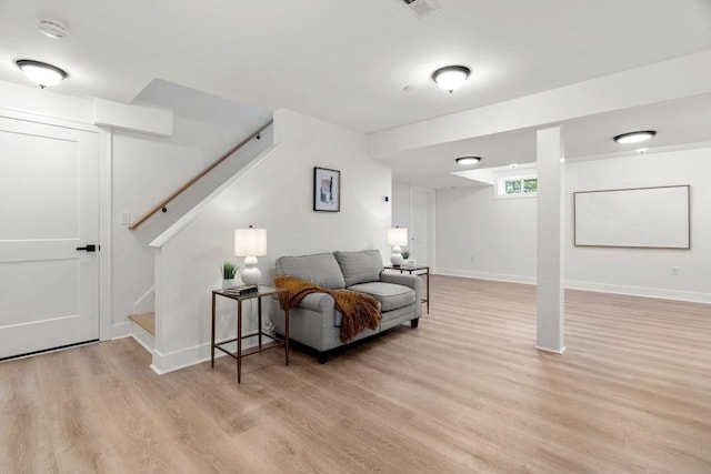 6 Sylvan Hill Xing, Haverhill, MA 01832 - living room with stairs, light wood-style flooring, and baseboards