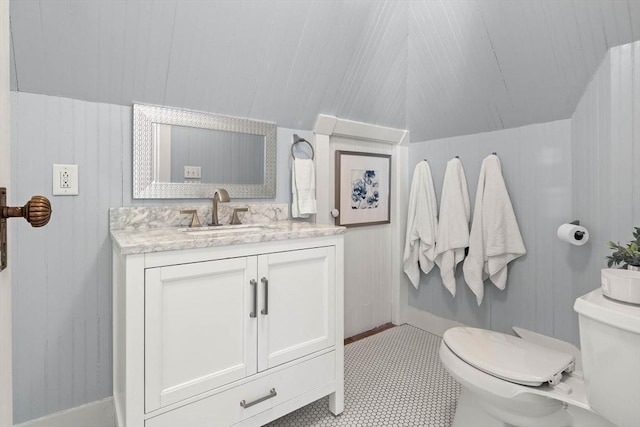 bathroom with toilet and vanity