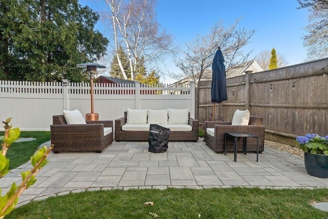 view of patio / terrace featuring a fenced backyard and outdoor lounge area
