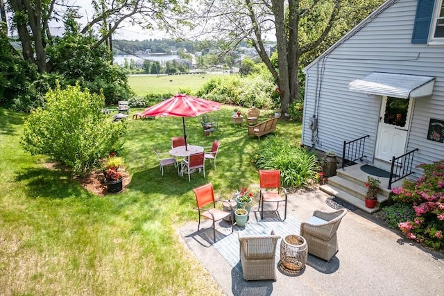 39 Crest Ave, Lunenburg, MA 01462 - view of green lawn with a patio and a water view