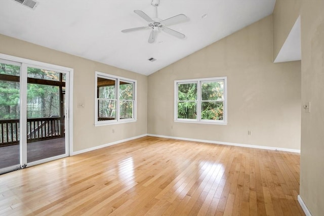 unfurnished room featuring baseboards, a ceiling fan, light wood-style flooring, and visible vents