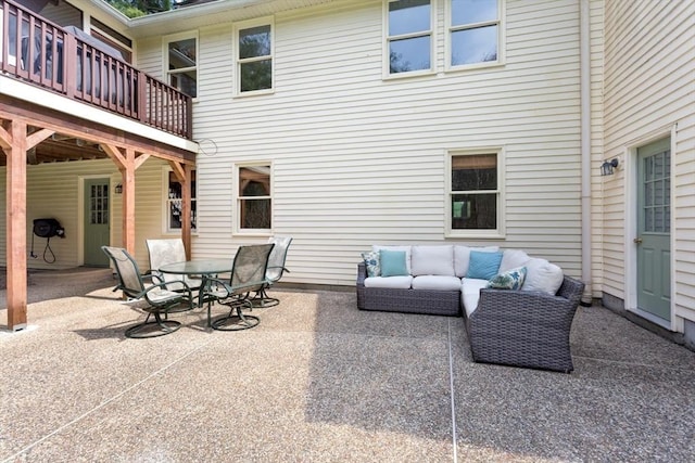 view of patio featuring an outdoor living space and outdoor dining area