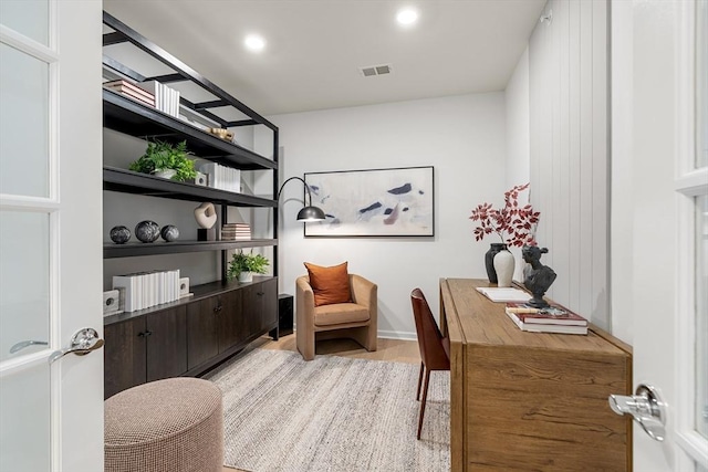 home office featuring visible vents, recessed lighting, and light wood-style floors