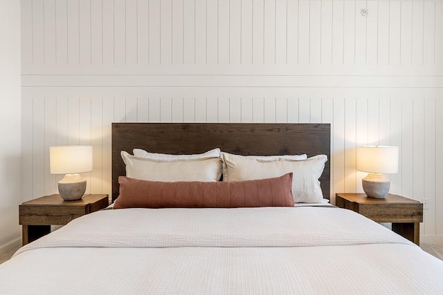bedroom featuring baseboards