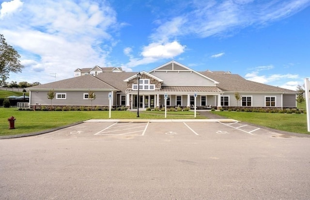 view of building exterior with uncovered parking