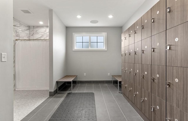 mudroom with recessed lighting, tile patterned floors, visible vents, and baseboards