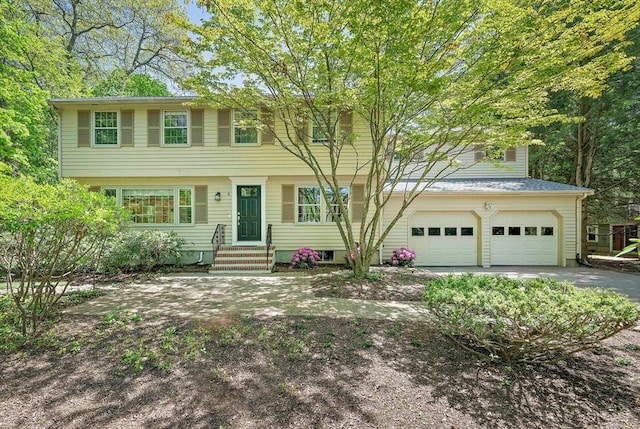 6 Garfield St, Lexington, MA 02421 - colonial home featuring a garage and asphalt driveway
