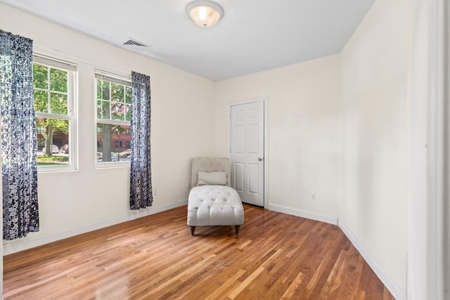 4-6 Marcella St Unit 2, Boston, MA 02119 - sitting room with light wood-style flooring and baseboards
