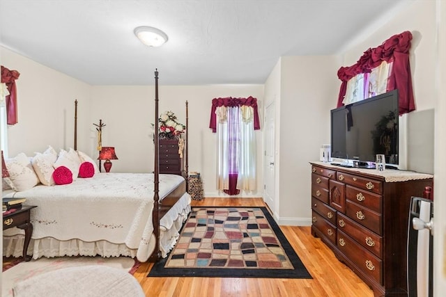 4-6 Marcella St Unit 2, Boston, MA 02119 - bedroom with light wood-type flooring and baseboards