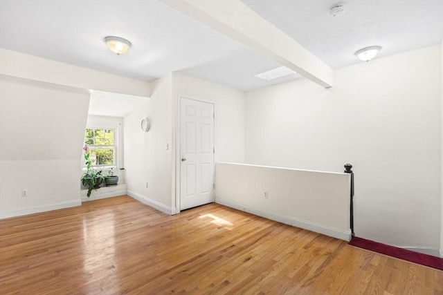 4-6 Marcella St Unit 2, Boston, MA 02119 - unfurnished room with light wood-style flooring, baseboards, and a smoke detector