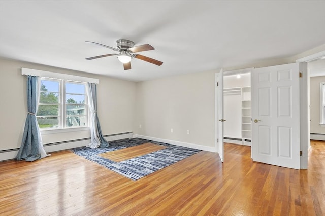 0 Steeple View Way, Leominster, MA 01453 - spare room with a ceiling fan, wood finished floors, a baseboard radiator, and a baseboard heating unit