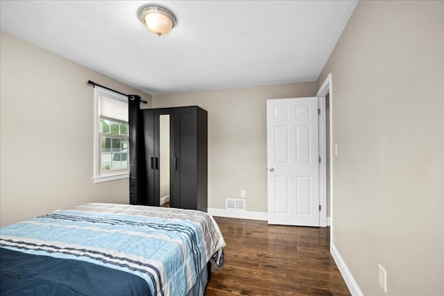 40 Richard Ave, Shrewsbury, MA 01545 - bedroom featuring dark wood-style flooring and baseboards