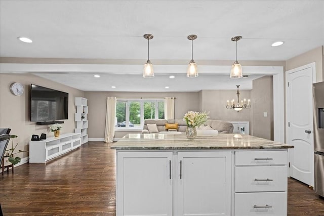 40 Richard Ave, Shrewsbury, MA 01545 - kitchen featuring open floor plan, dark wood-style flooring, white cabinets, baseboards, and light stone counters