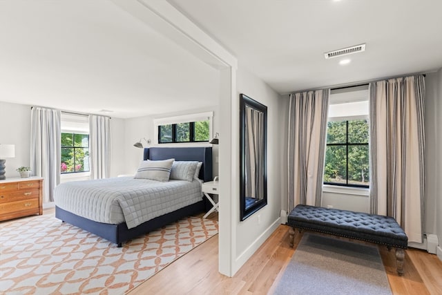 bedroom featuring light wood-type flooring