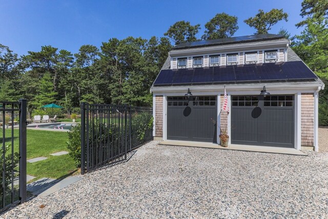 garage with a yard