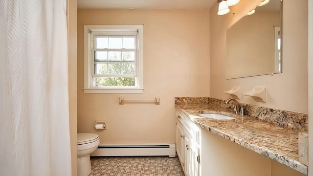 36 Jean Dr, North Attleboro, MA 02760 - bathroom with a baseboard radiator, toilet, and vanity