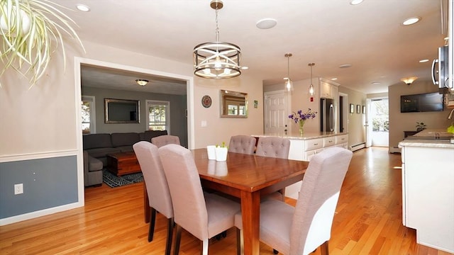 36 Jean Dr, North Attleboro, MA 02760 - dining space with light wood finished floors, a baseboard heating unit, recessed lighting, baseboards, and a chandelier
