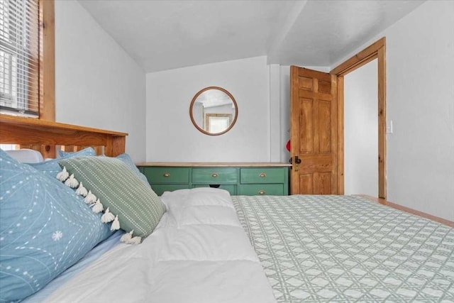 bedroom featuring baseboards