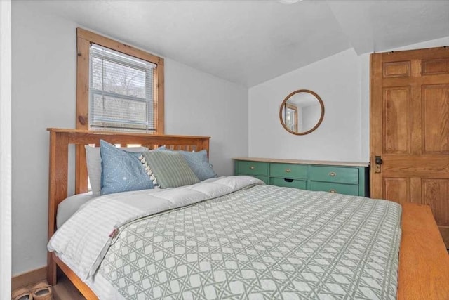 bedroom with vaulted ceiling